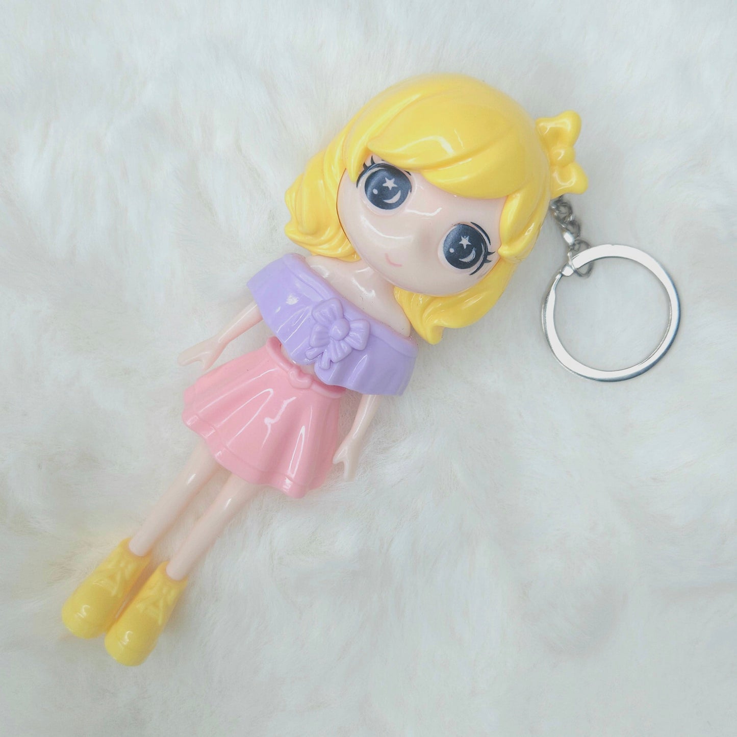 Keychain with a cartoon-style character on a white background