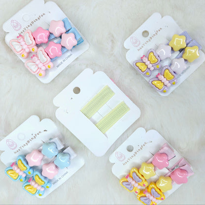 Set of colorful hair clips on their packaging with a soft background