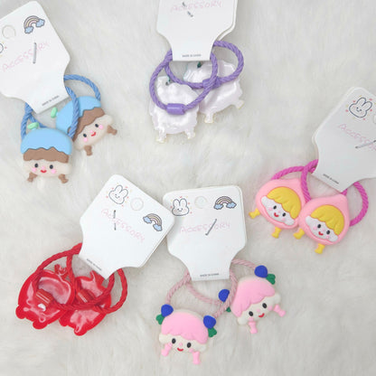 Set of colorful hair ties with cartoon characters on white background