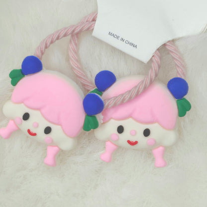 Two pink character hair ties with blue and green accents on a white background.