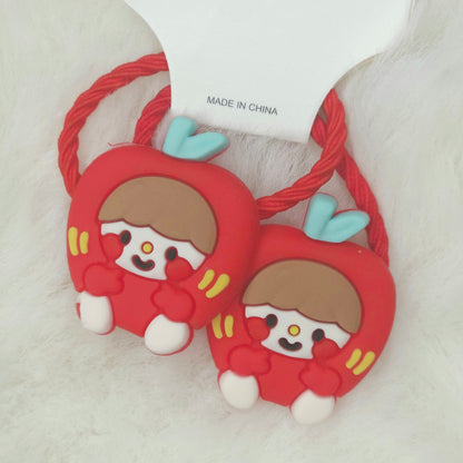 Red hair ties with cartoon character ends on a white background