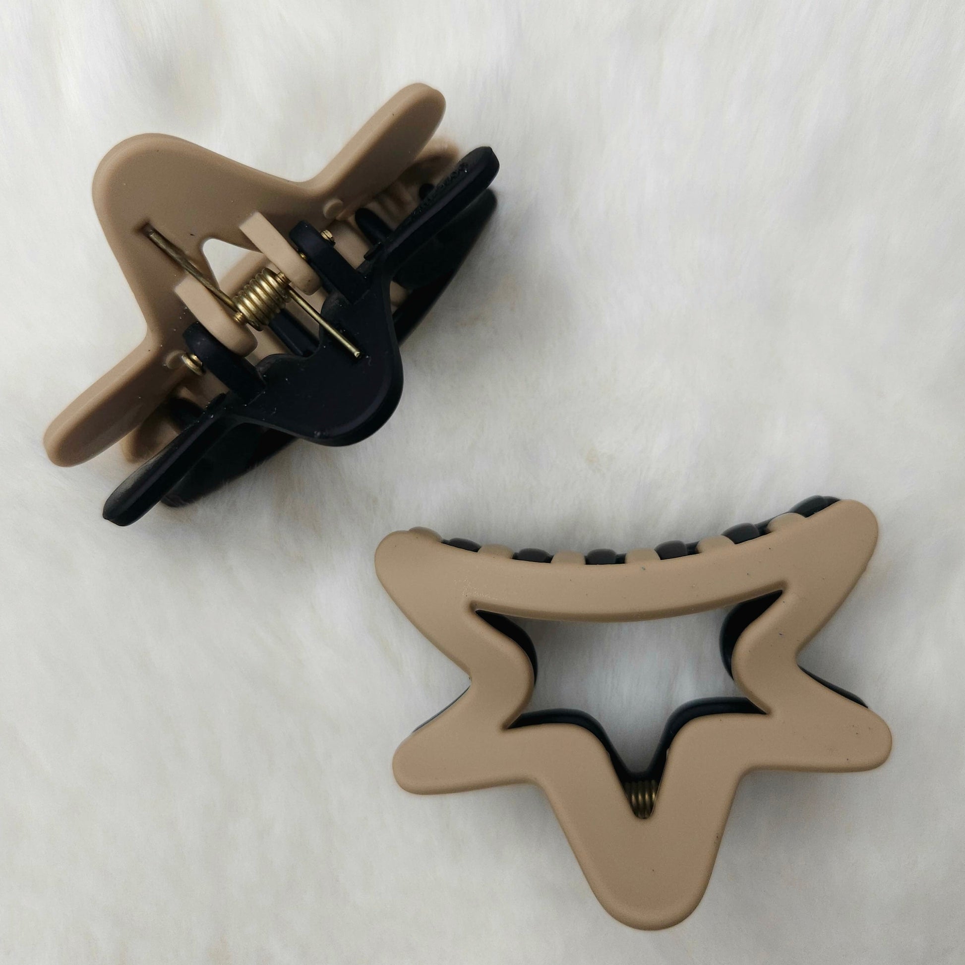 Star-shaped hair clips on a white background