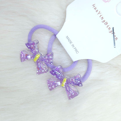 Two purple hair ties with glittery bows on a white background, branded 'HuaYingBingyan'.