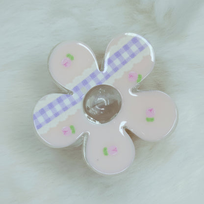 Pastel white kawaii style flower hair claw, featuring small printed roses and glossy finish.