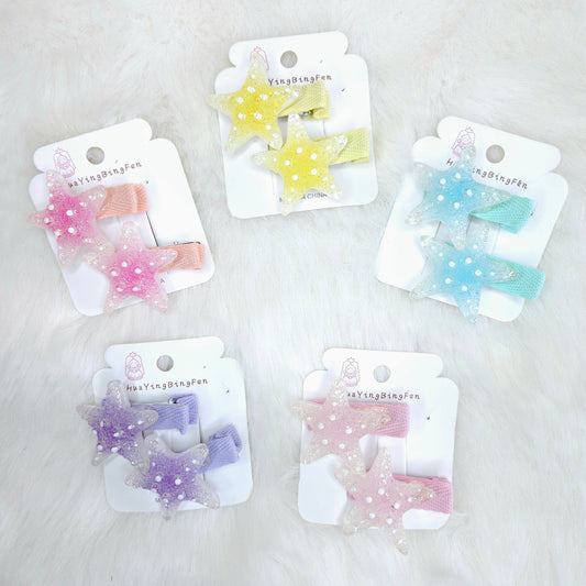 Set of five star-shaped hair clips on cards with 'Nanying Dingshufen' branding against a light background.