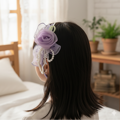 Person wearing a decorative headband with flowers and pearls in a bedroom setting