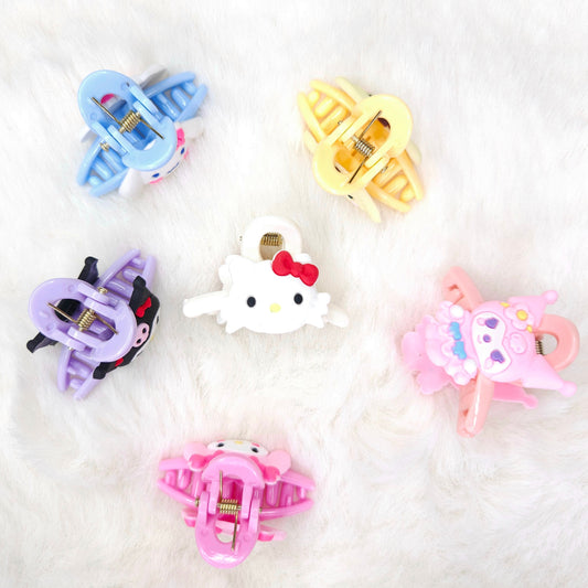 Set of colorful hair clips on a white background