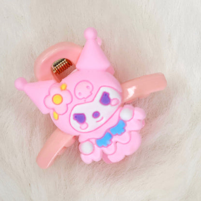 Pink cartoon character hair clip on a white background