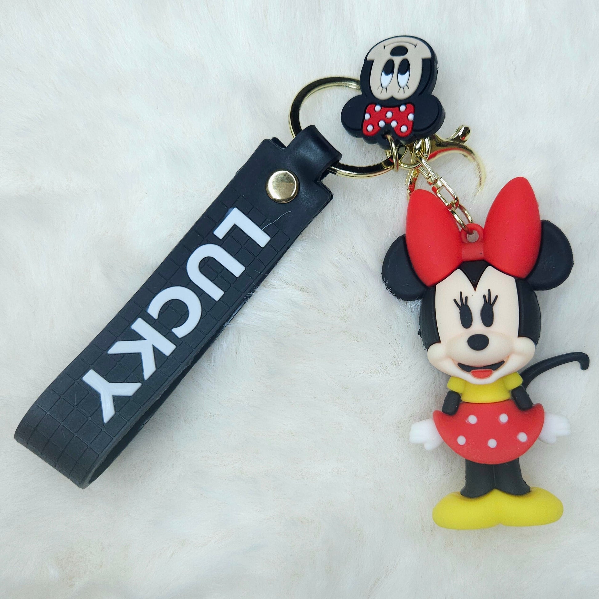 Minnie Mouse keychain with a black strap labeled 'LUCKY' on a white background