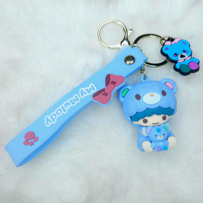 Keychain with a blue character and strap on a white background