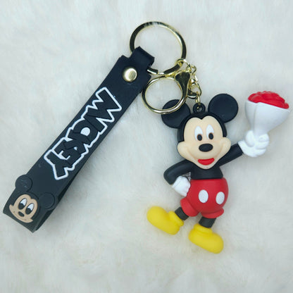 Keychain with a cartoon character holding a cup on a white background